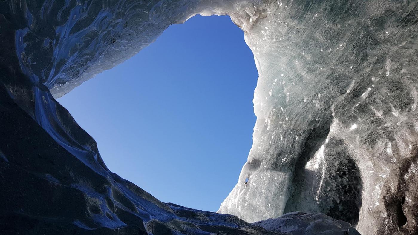 Porte ouverte qualite de vie sophro ciel bleu grotte islande